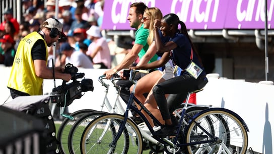 Multiple people on bikes.