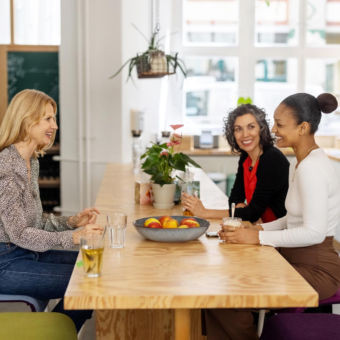 Business people discussing during coffee break