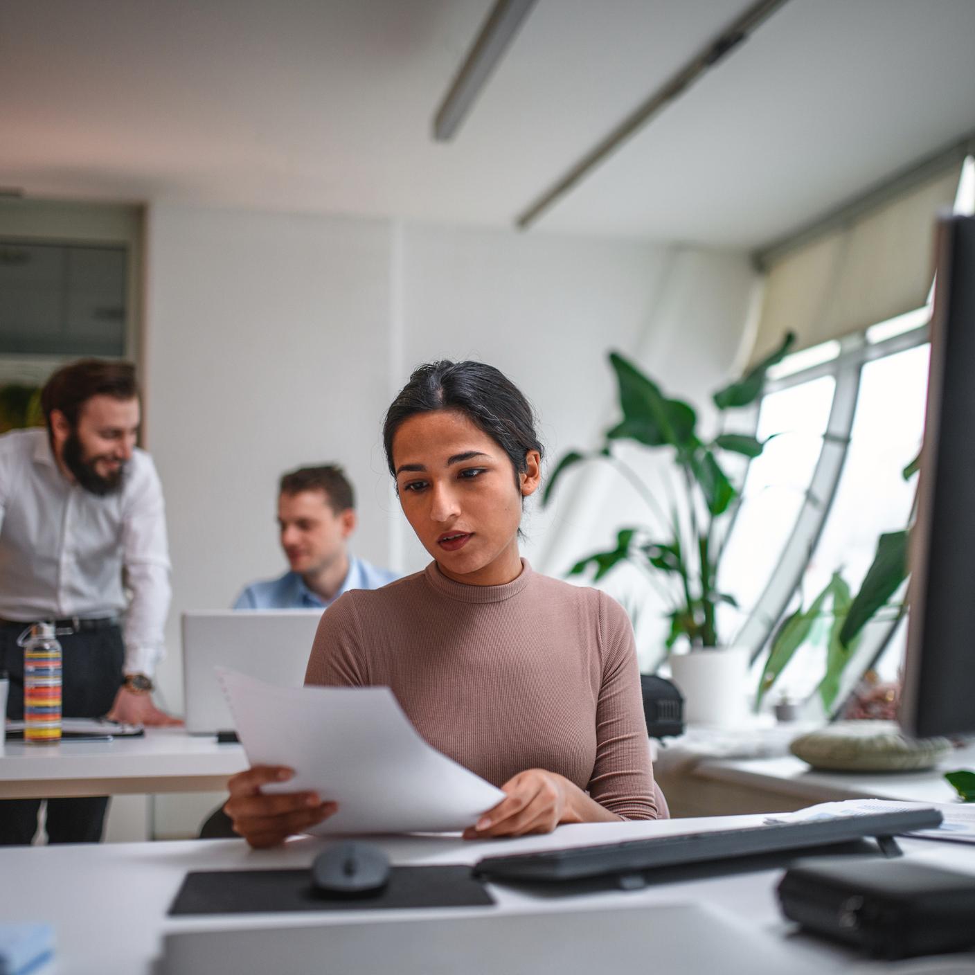 female at office desk
