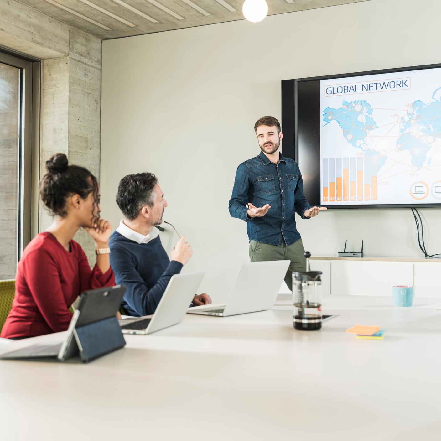 The guy is talking in the meeting room 