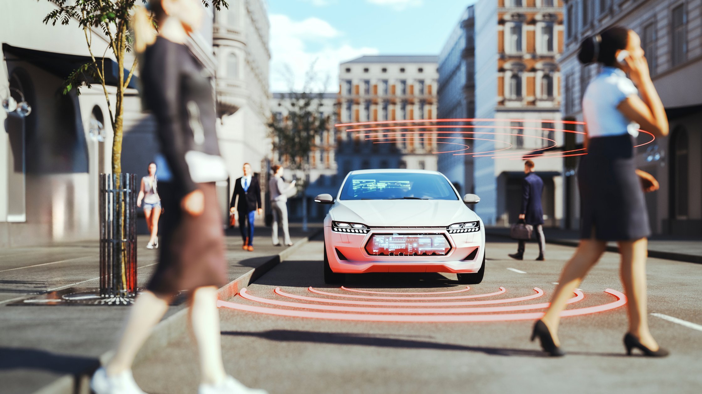 people crossing with car on road