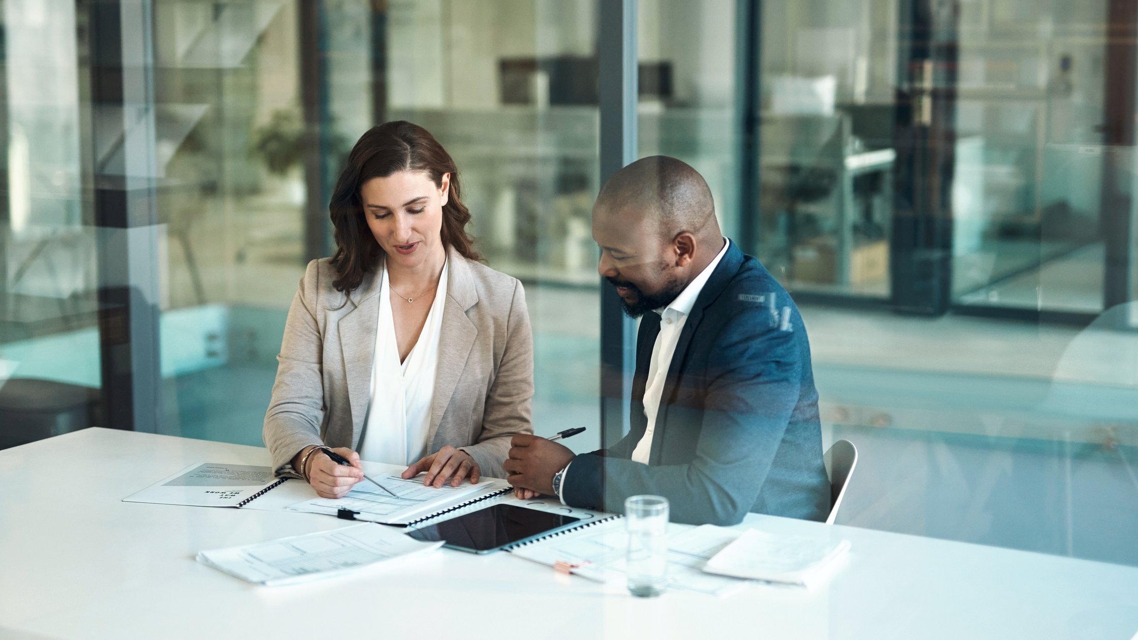 Office, meeting and documents of business people, clients or team for legal matters, taxes, audit or accounting. 